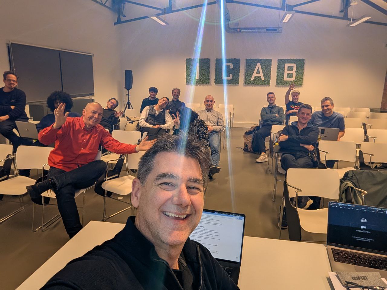 Group selfie at the Brussels meetup — 15 faces to identify